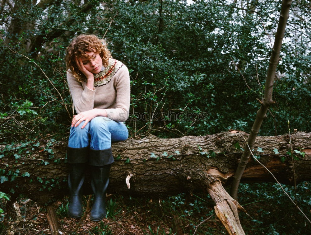 Similar – Image, Stock Photo young pregnant woman with long hair sits smiling on a tree trunk in the forest