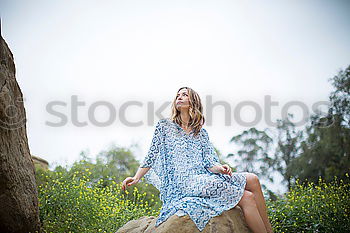 Similar – Image, Stock Photo Little girl in nature field wearing dress with poppies