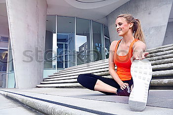 Similar – Image, Stock Photo Sporty young woman sitting on forecourt with her mobile