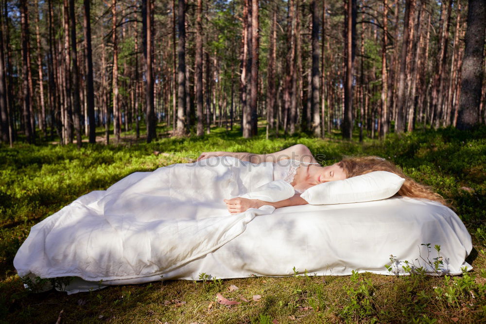 Similar – Young redhead hippie woman resting in nature