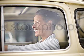 Similar – Image, Stock Photo Arab girl inside an old van parked in a campsite