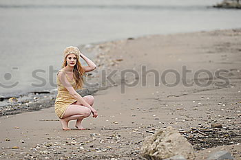 Similar – Image, Stock Photo Girl sitting in front of a lake