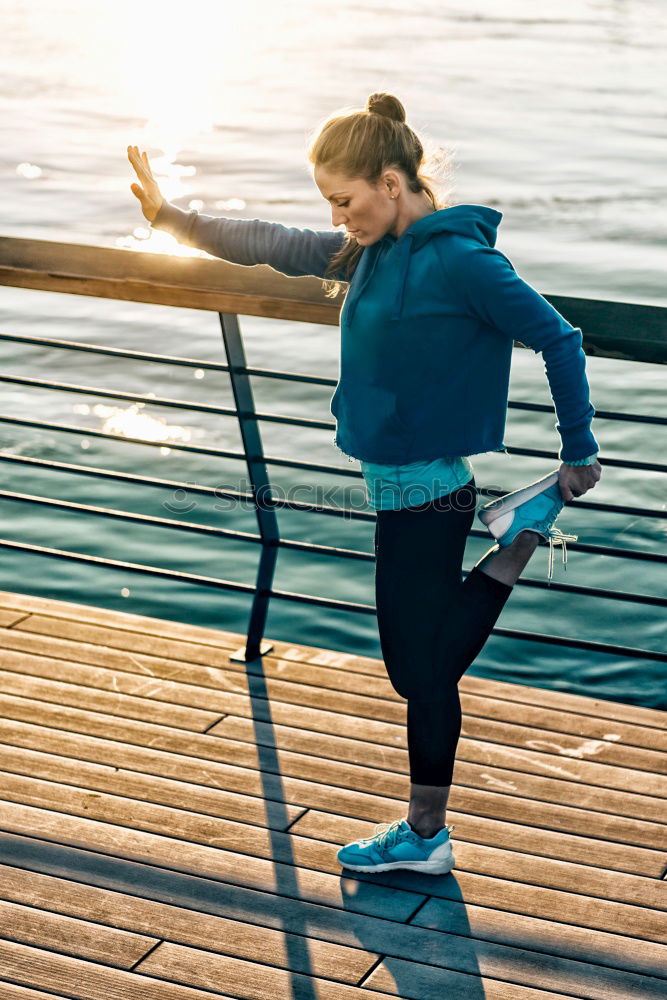 Similar – Image, Stock Photo Woman warming up before outdoor workout