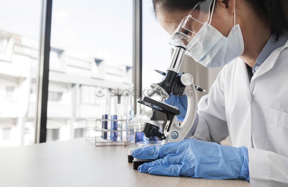 Similar – Image, Stock Photo Woman looking at microscope