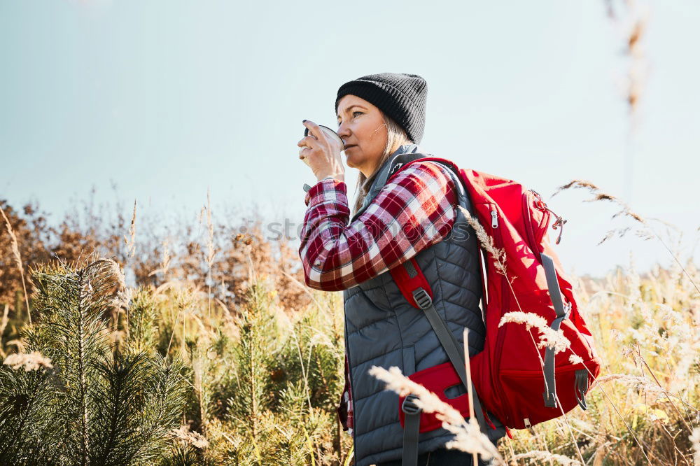 Young Backpacker enjoying of Nature.