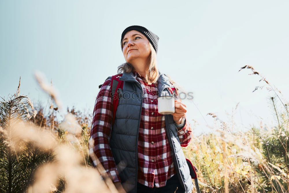 Similar – Girl sitting in autumn forest