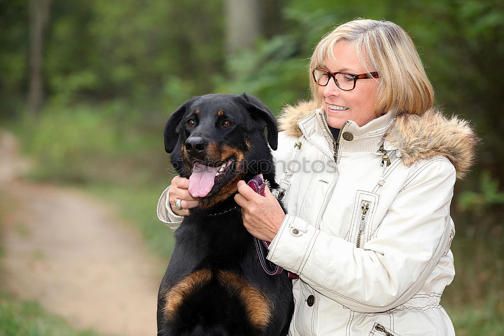 Similar – Image, Stock Photo Young woman with a Weimaraner hunting dog chilling in the forest