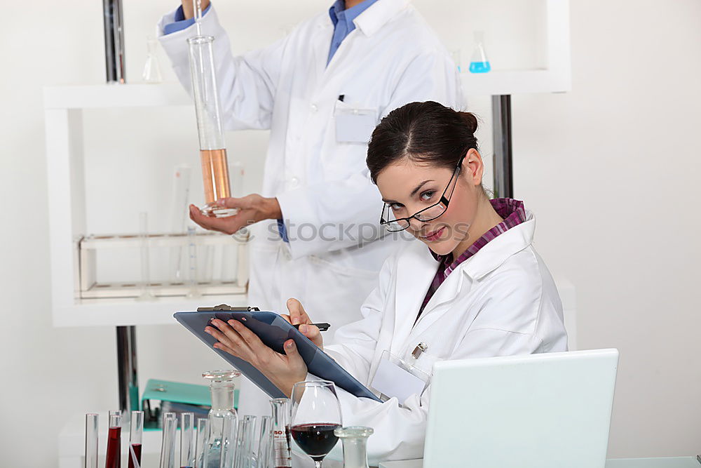 Similar – Image, Stock Photo Woman with papers in lab