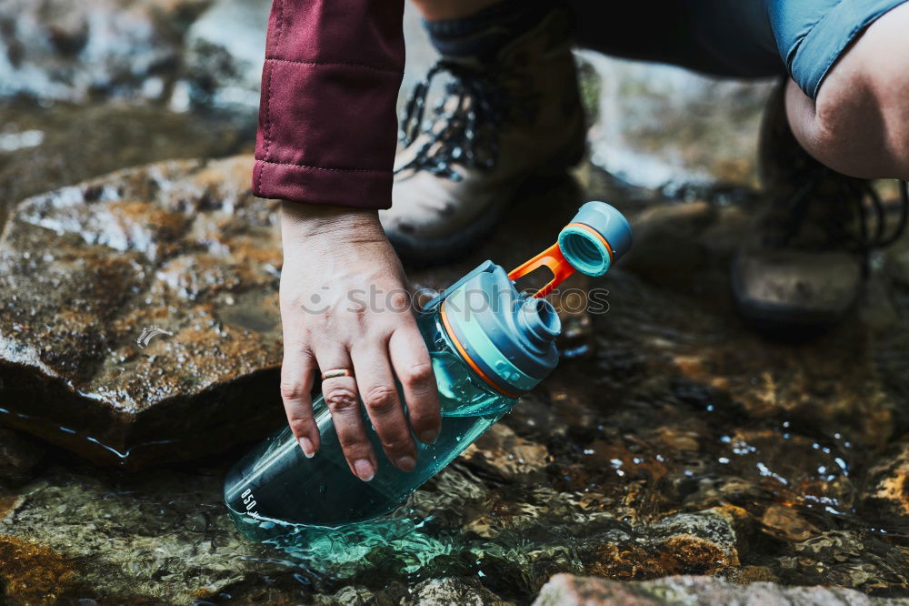 Similar – Image, Stock Photo Legs in leather boots in puddle