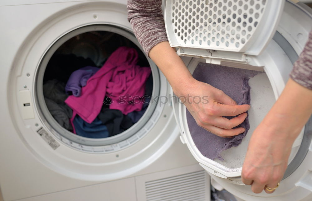 Similar – Face mask in a washing machine, hygiene, disinfection