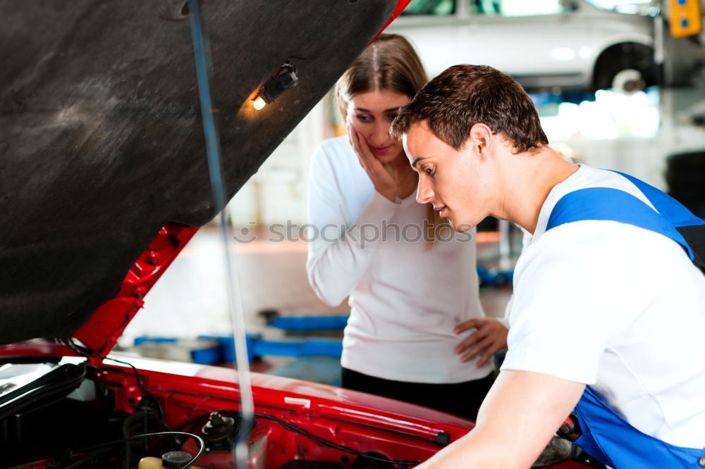 Man working on bike in shop