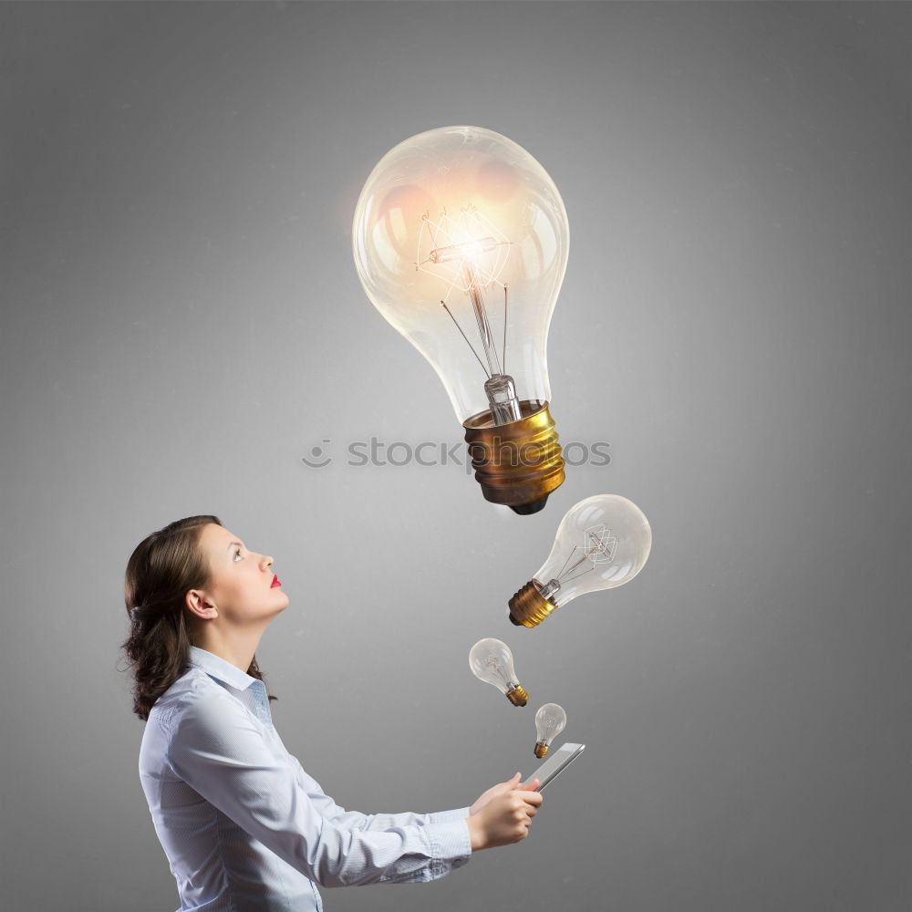 Female hand holding a shining light bulb, Great idea, innovation and inspiration, business concept background