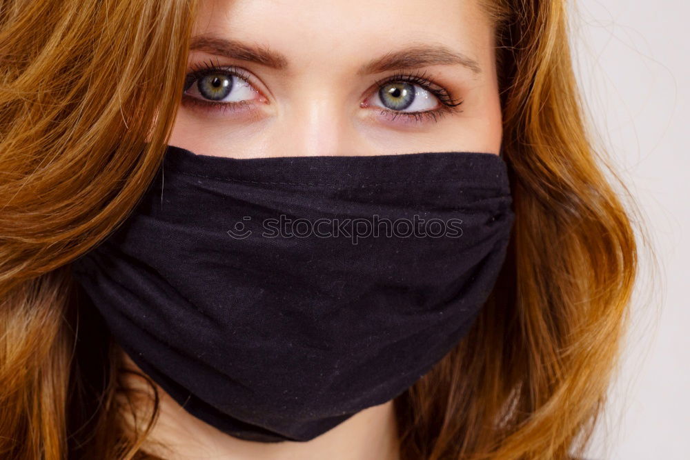 Similar – Image, Stock Photo young woman wearing homemade everyday cloth face mask outdoors in city