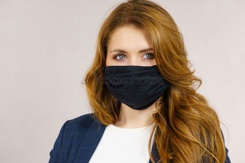 Similar – Image, Stock Photo young woman wearing homemade everyday cloth face mask outdoors in city