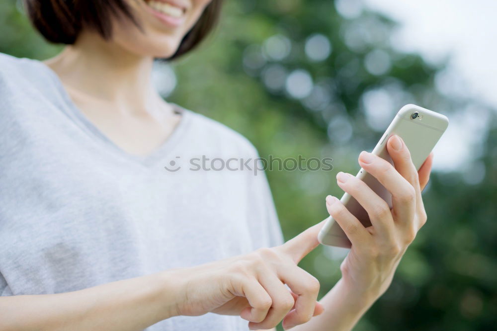 Similar – Image, Stock Photo Young beautiful woman in yellow dress using mobile phone