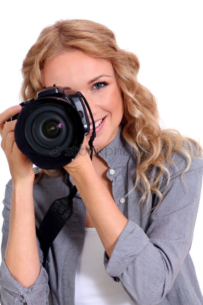 Similar – Image, Stock Photo Young blonde girl using an instant camera