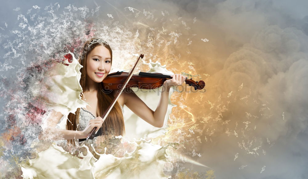 Similar – Pretty young violinist playing the violin