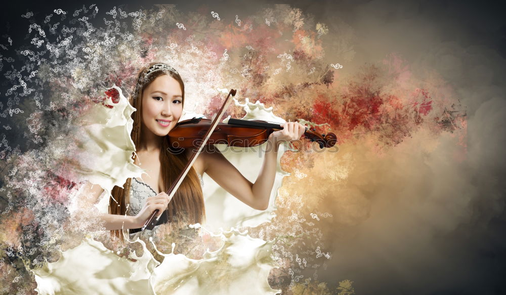 Similar – Pretty young violinist playing the violin