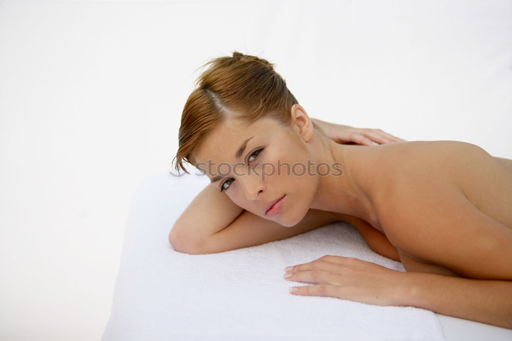 Similar – Young blond woman having massage in the spa salon.