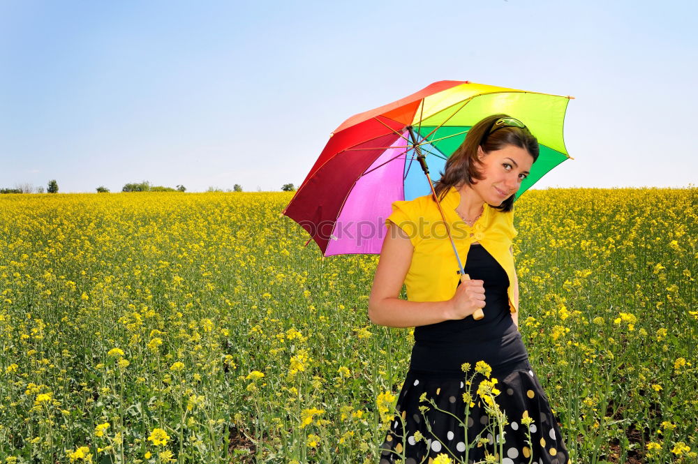 Similar – Image, Stock Photo Woman holding the Gay Rainbow Flag on green meadow outdoor