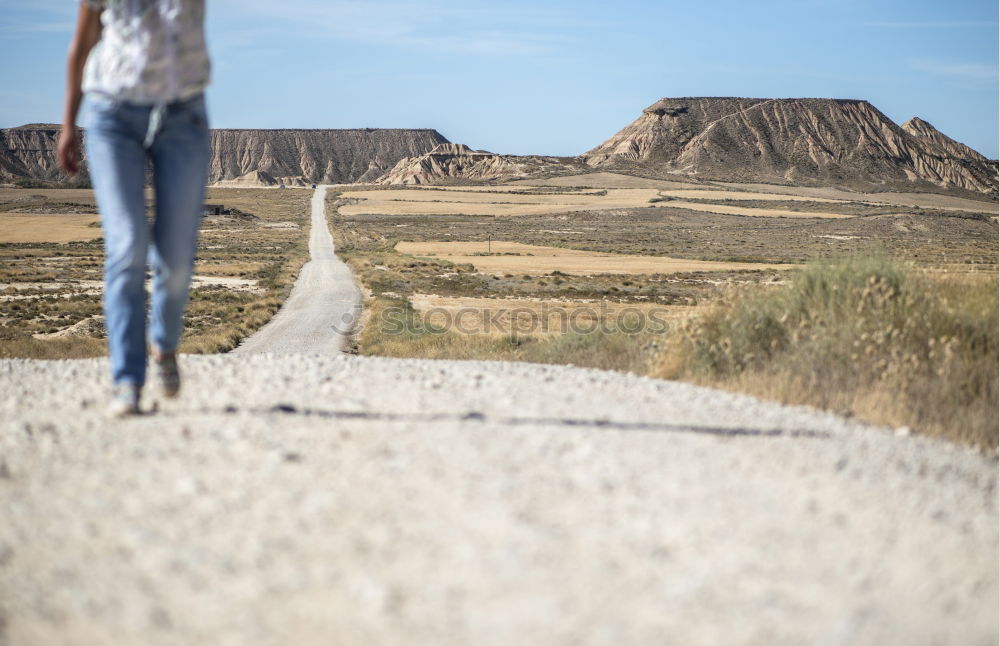 Similar – Image, Stock Photo Women walking on sandy hill