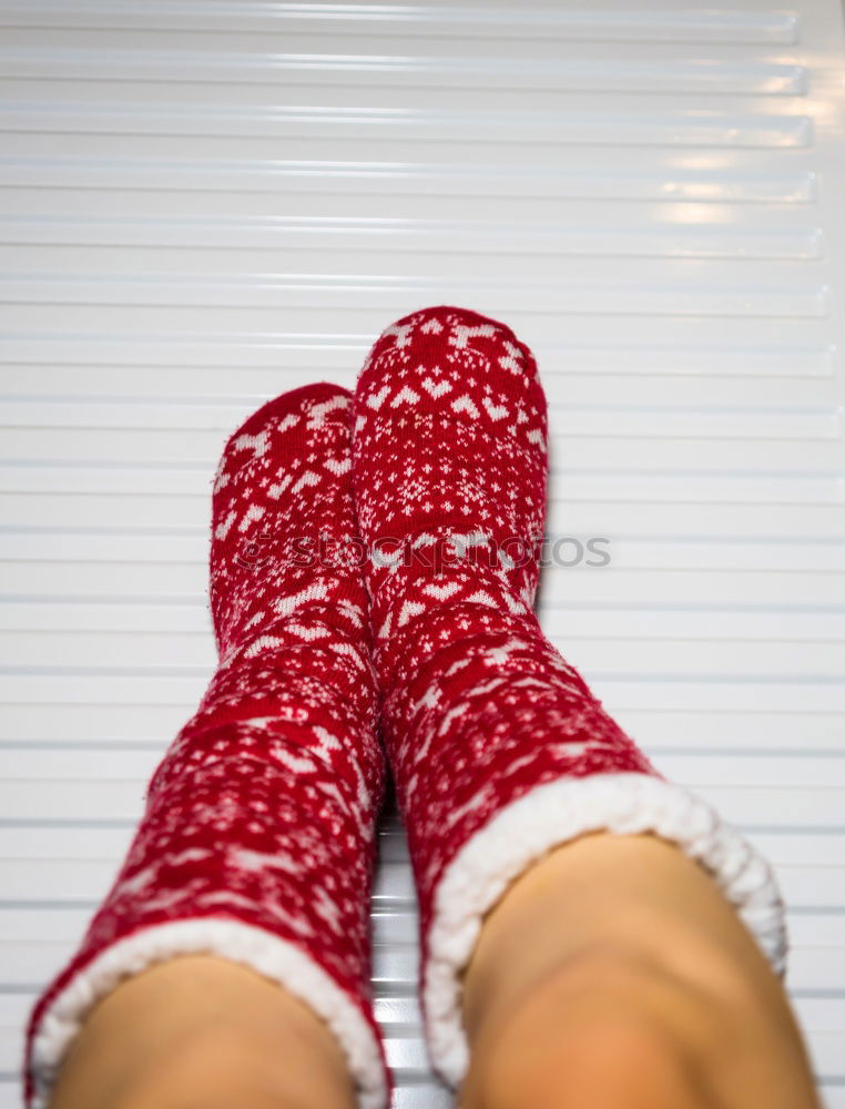 Similar – Heating season. Feet in socks. Heat room with fan heater electric heating at home.