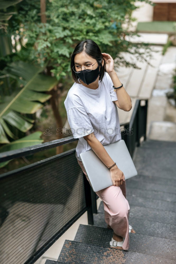 Similar – Image, Stock Photo Pretty stylish woman putting on cap