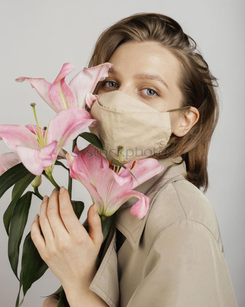 Similar – Image, Stock Photo Lifestyle portrait of happy young adult woman enjoying flowers