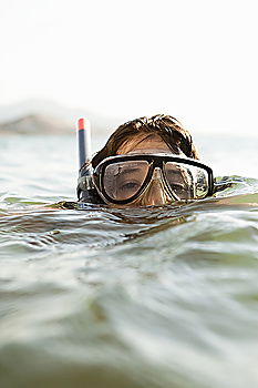 Similar – Diver posing in water Man