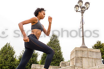 Similar – Black woman, afro hairstyle, running outdoors