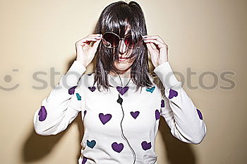 Similar – Portrait of senior woman with sunglasses insulting with finger