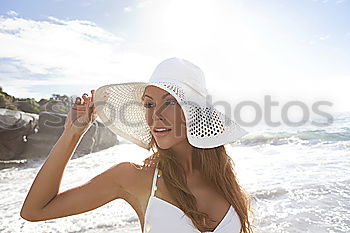 Similar – Young Woman Portrait With White Beach Hat