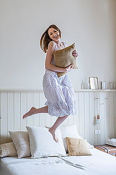 Similar – Image, Stock Photo beautiful kid girl playing and jumping on bed