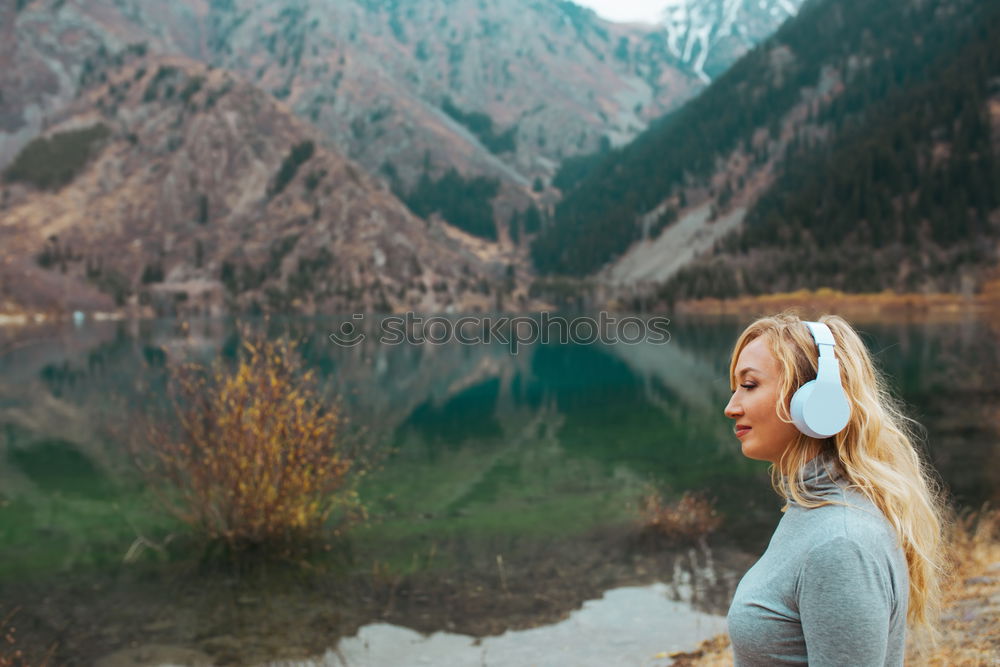 Similar – Smiling woman at lake