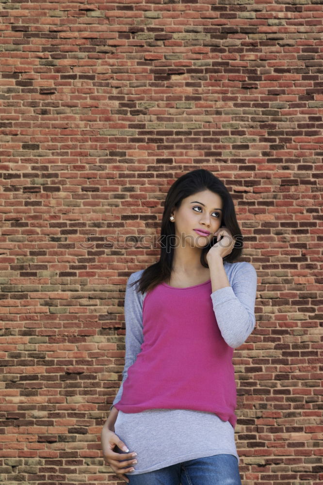 Similar – A young woman sitting on a garden bench