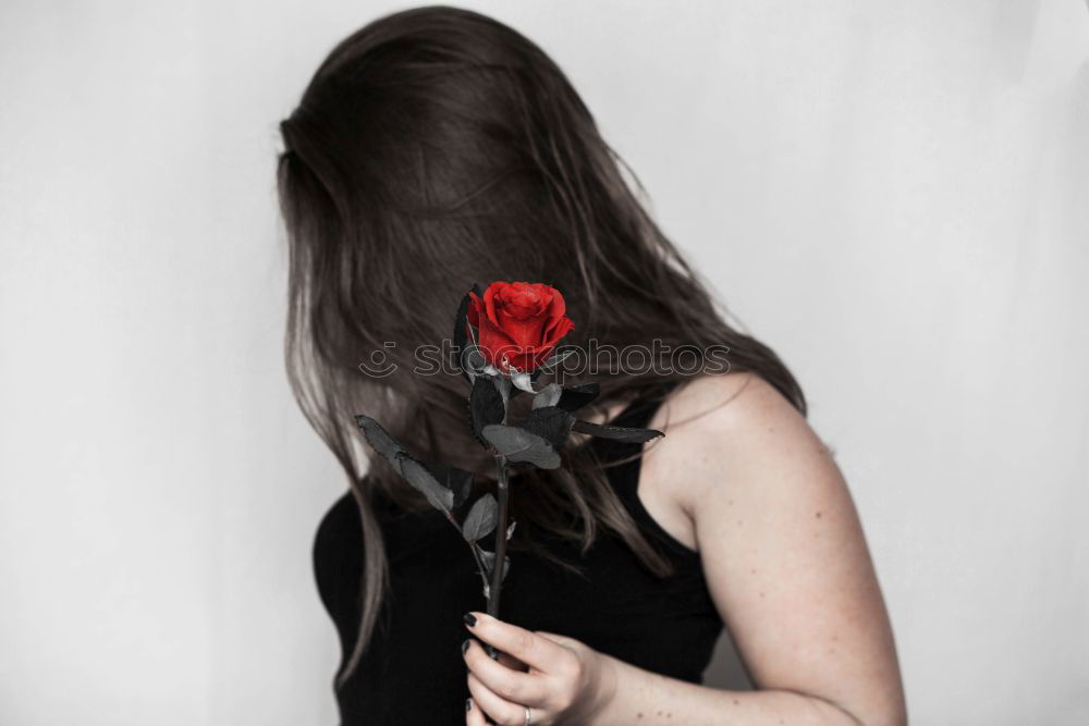 Similar – Young woman holding a red heart