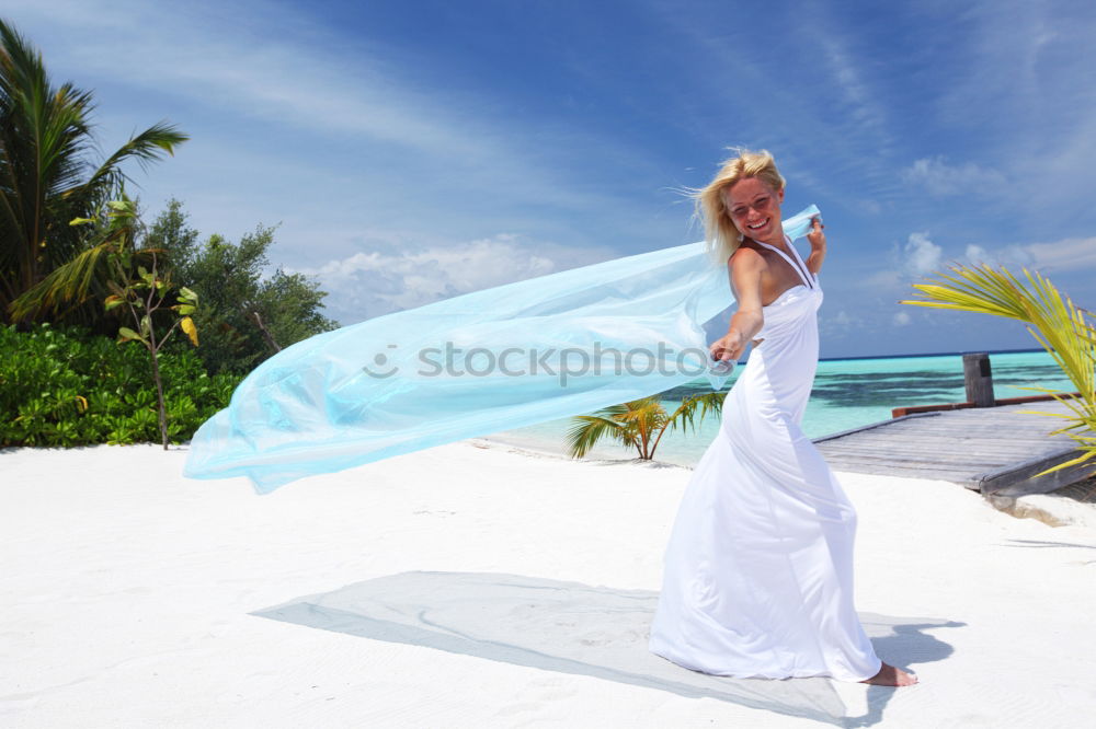 Similar – Image, Stock Photo Bride on the beach Wedding