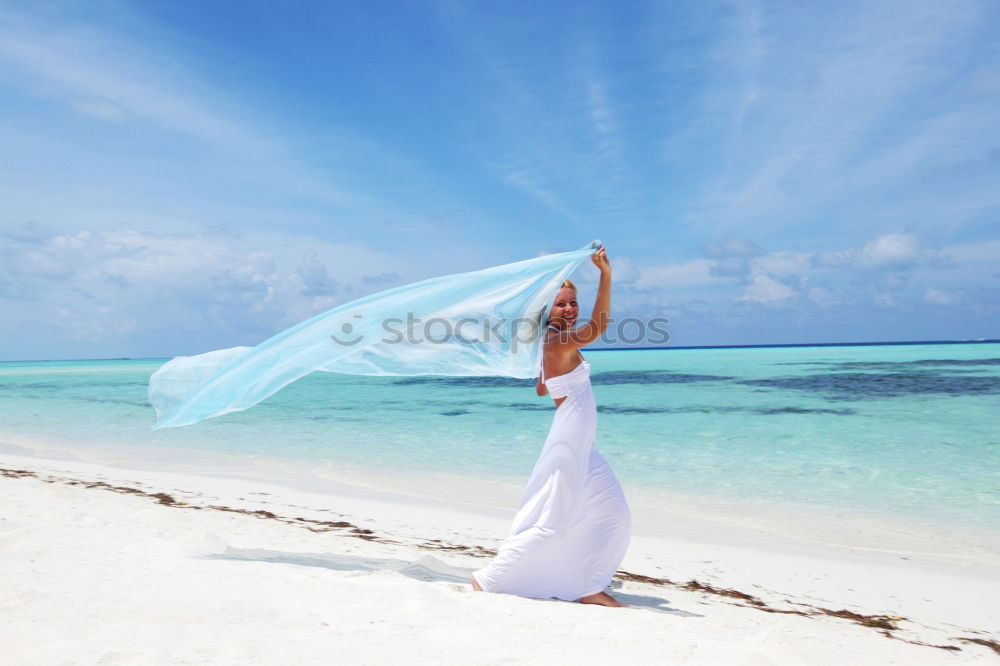 Similar – Image, Stock Photo Bride on the beach Wedding