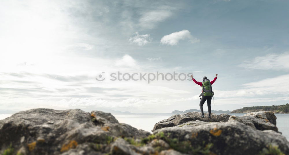 Similar – Tourist jumping over gorge