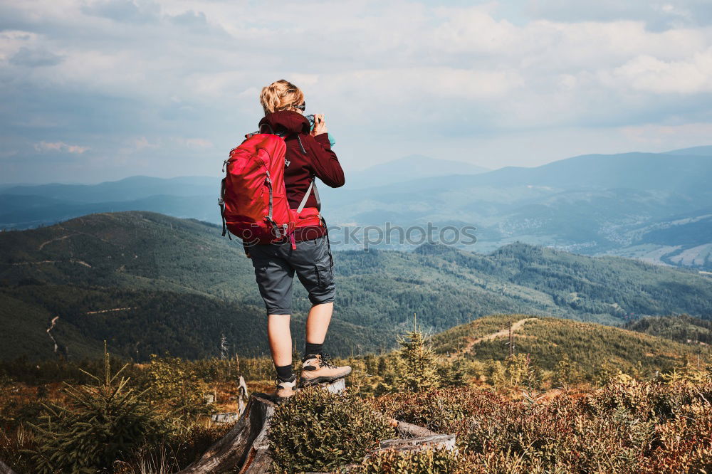 Similar – Image, Stock Photo Young woman hiking, Timmelsjoch E5.