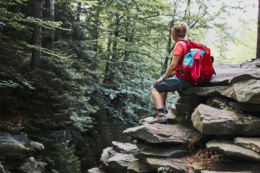 2 people hiking show their hiking boots