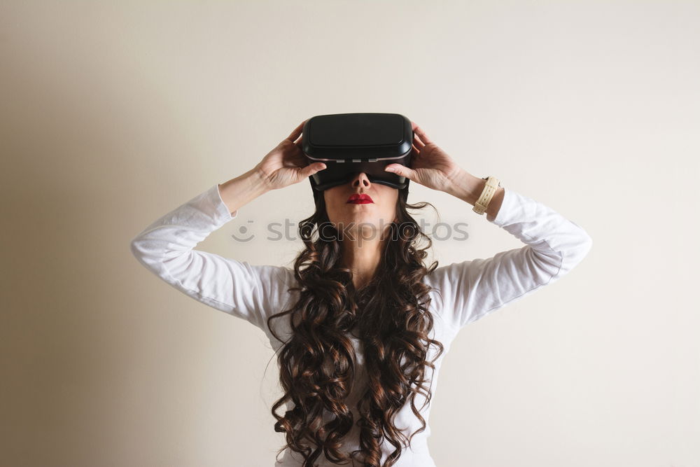 Similar – Image, Stock Photo young black woman wears virtual reality VR headset