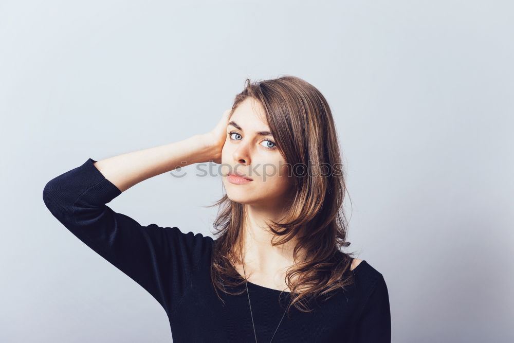 Similar – Close up portrait of a beautiful young woman