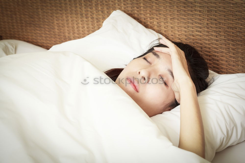 Similar – Little girl lying in a bed with teddy bear at the morning