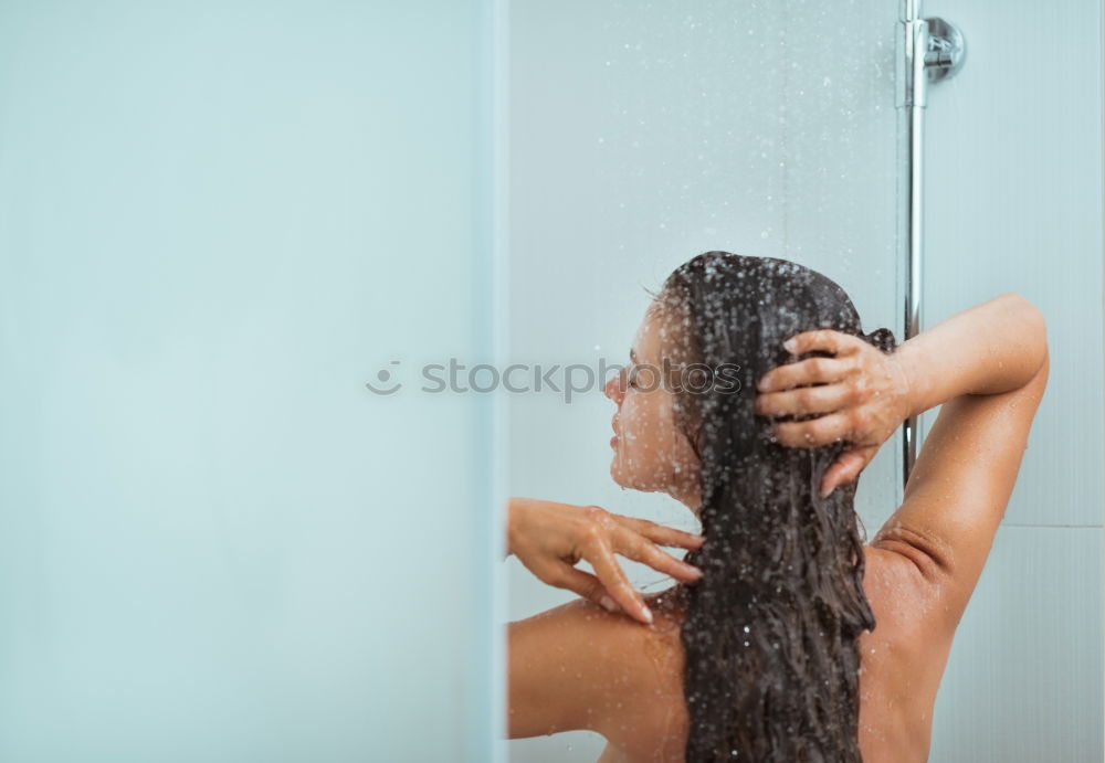 Similar – Woman shampooing her long brown hair