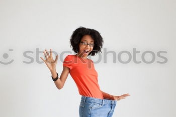Similar – Image, Stock Photo Mixed woman with afro hairstyle sitting in urban park