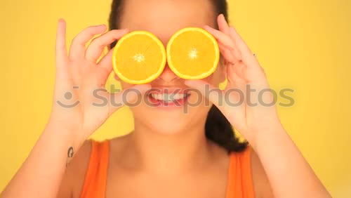 Similar – Smiling woman between slices of orange