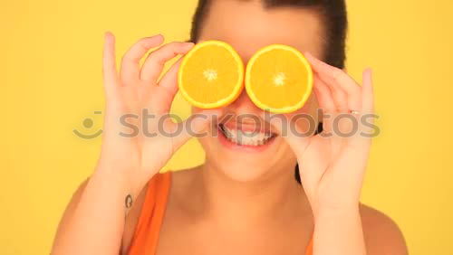 Similar – Smiling woman between slices of orange