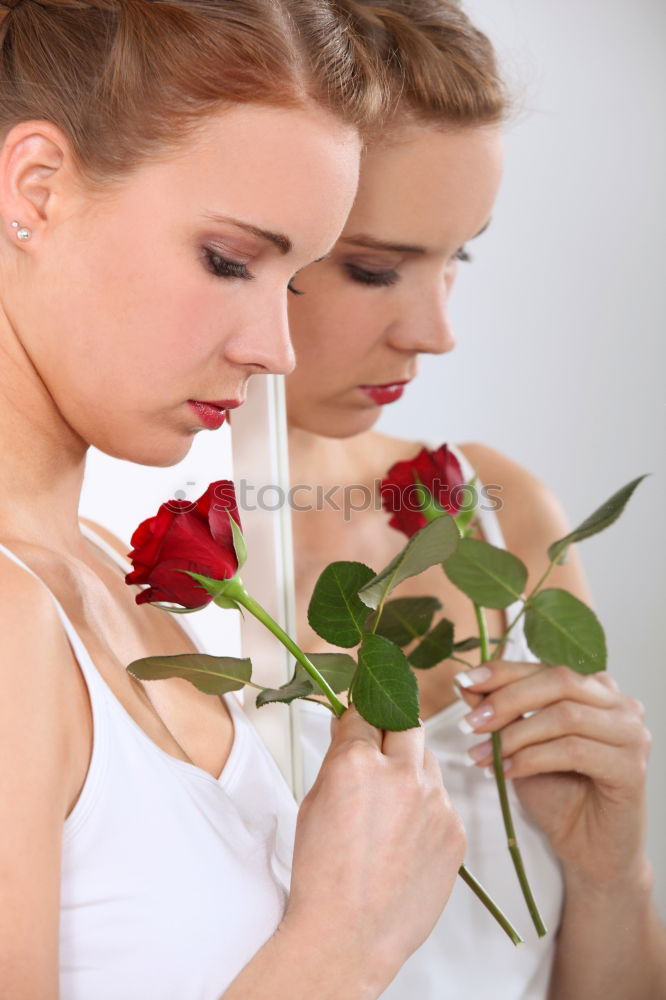 Similar – Image, Stock Photo Young man with red flowers