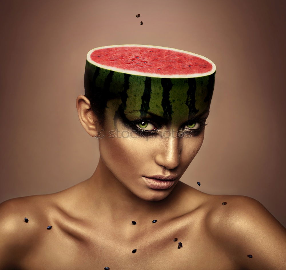 Similar – Not so young woman finally biting in watermelon